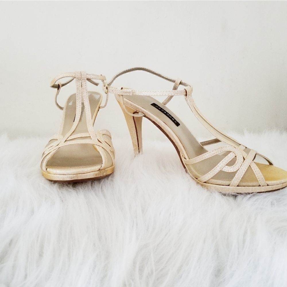 Caparros heeled strappy shoes.